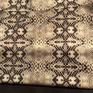 Snakeskin pattern pencil skirt.